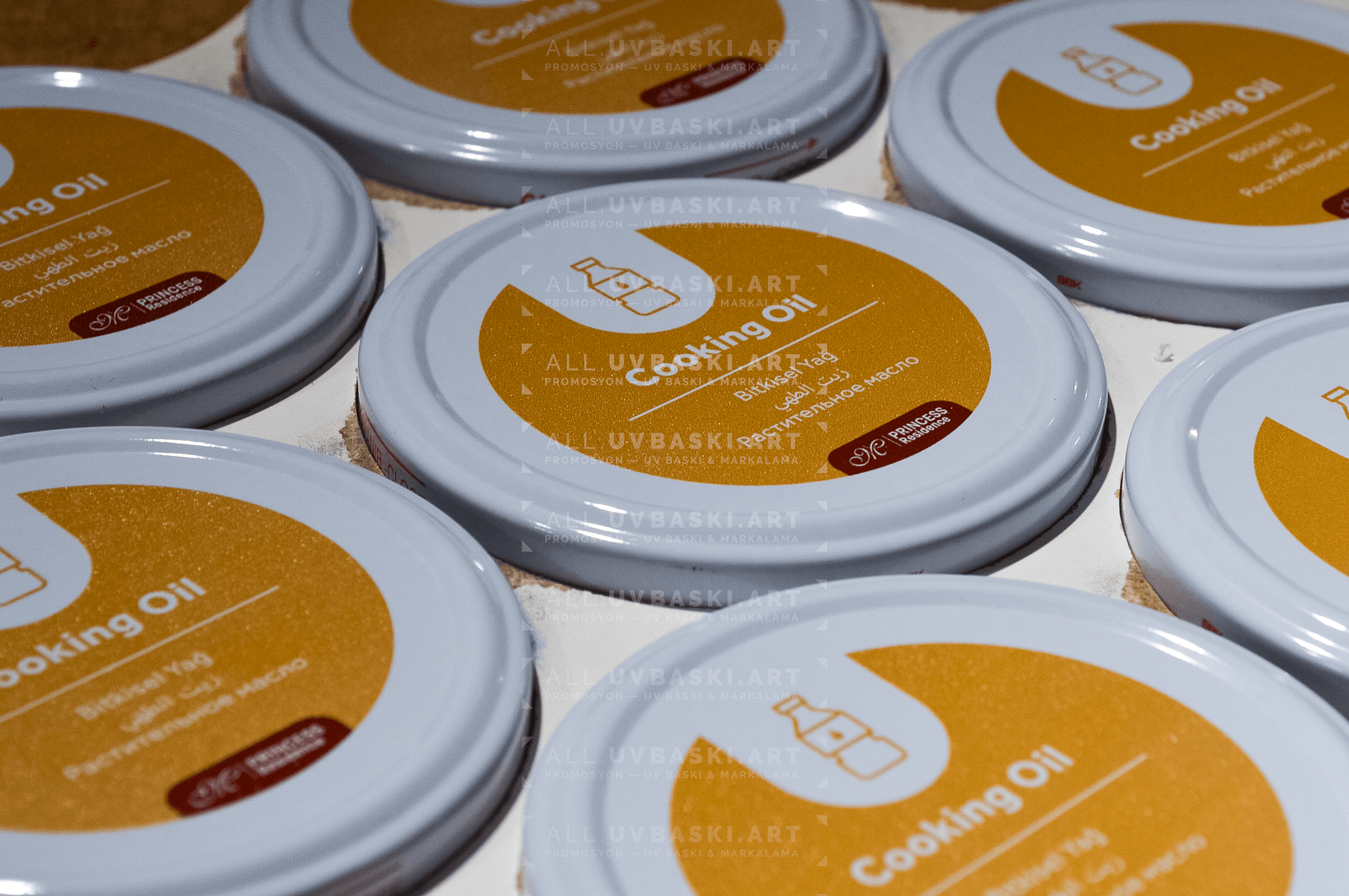 Beyaz kavanoz kapağı üzerine otel logosu, UV baskı örneği.